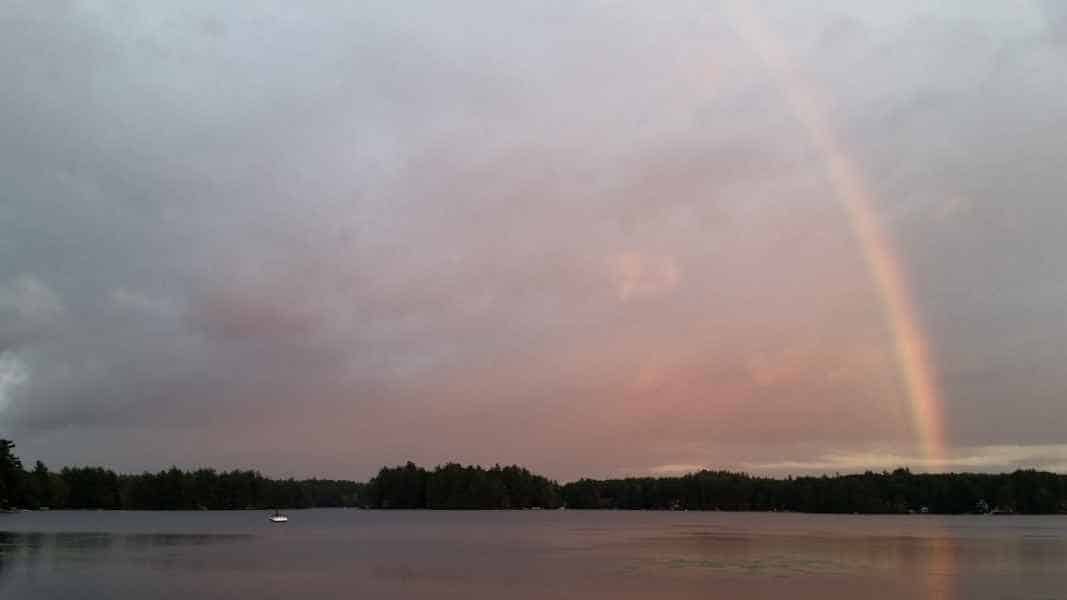 Rainbow over Open Water at Lake in Barrington, New Hampshire